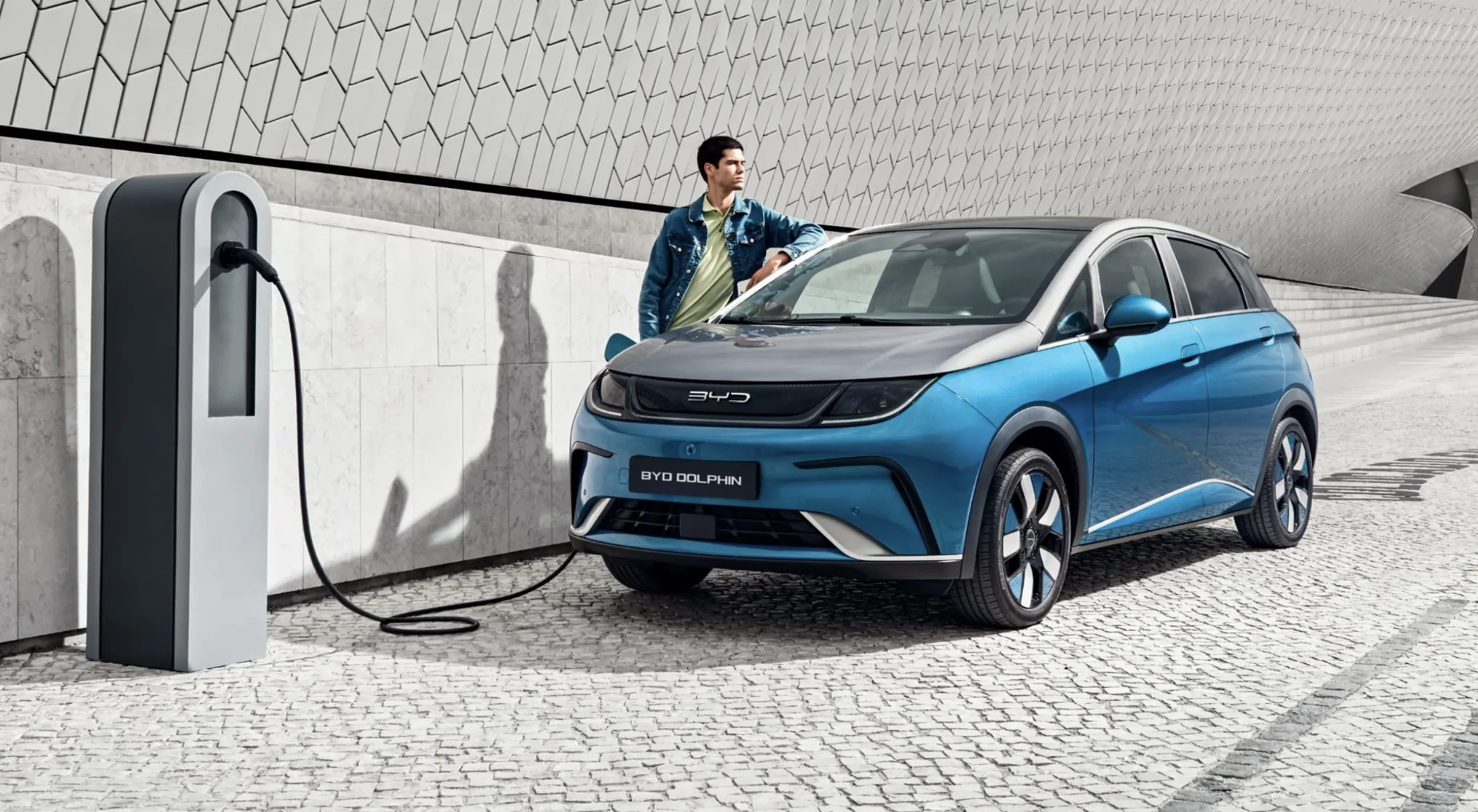 BYD Dolphin plugged into a charger