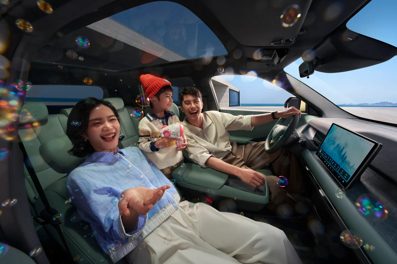 Family seated inside the Dongfeng Nammi Vigo cabin