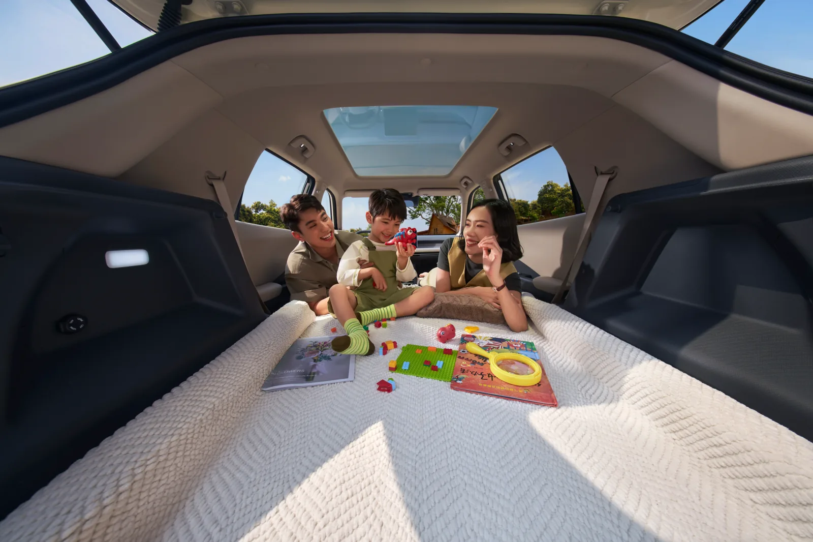 Nammi Vigo seats folded flat into a bed