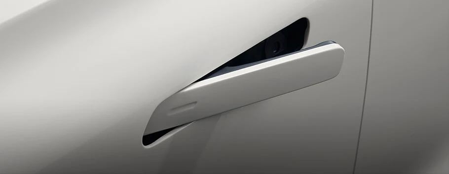 Powered flush door handle