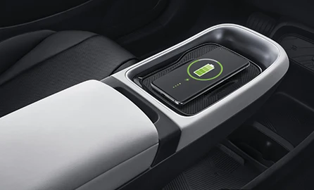 Wireless charging pad on the floating console