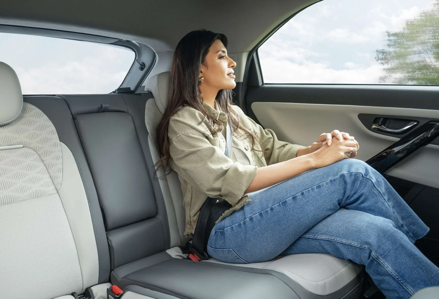 Passenger seated in the Tata Nexon EV rear bench