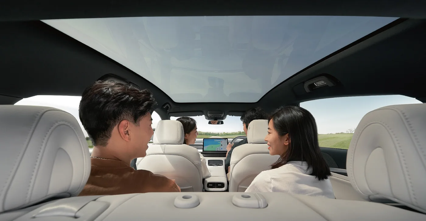 Passengers under the XPENG G6 panoramic glass roof